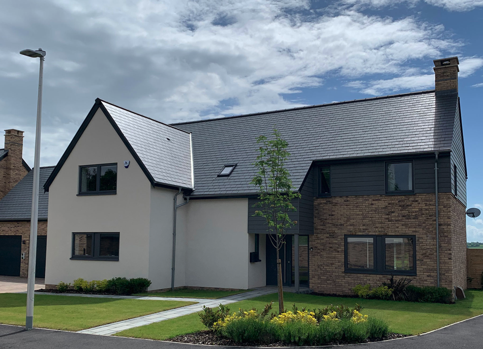 Modern home with slate roofing