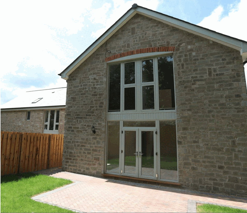 Traditional stone house with feature windows
