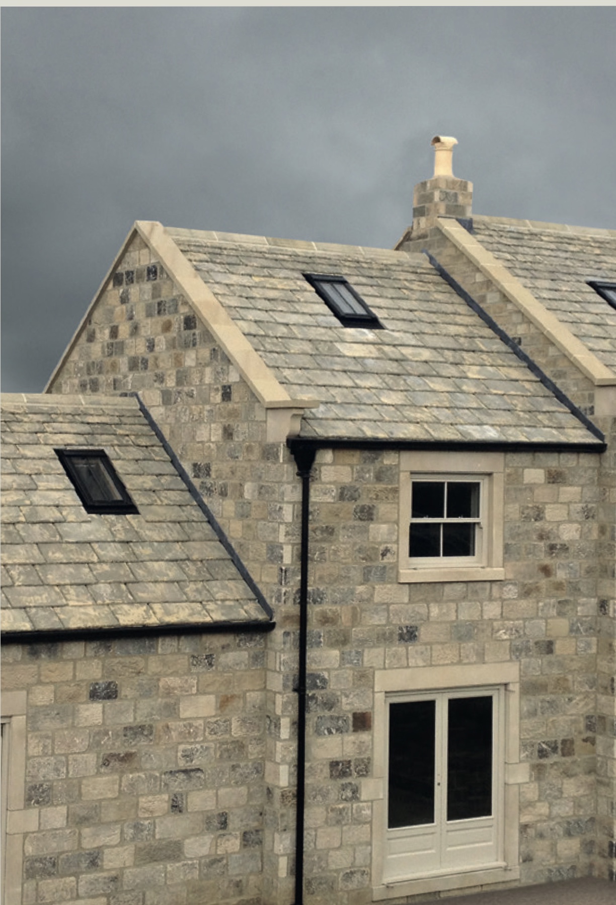 Cotswold roof laid in random diminishing courses of natural stone